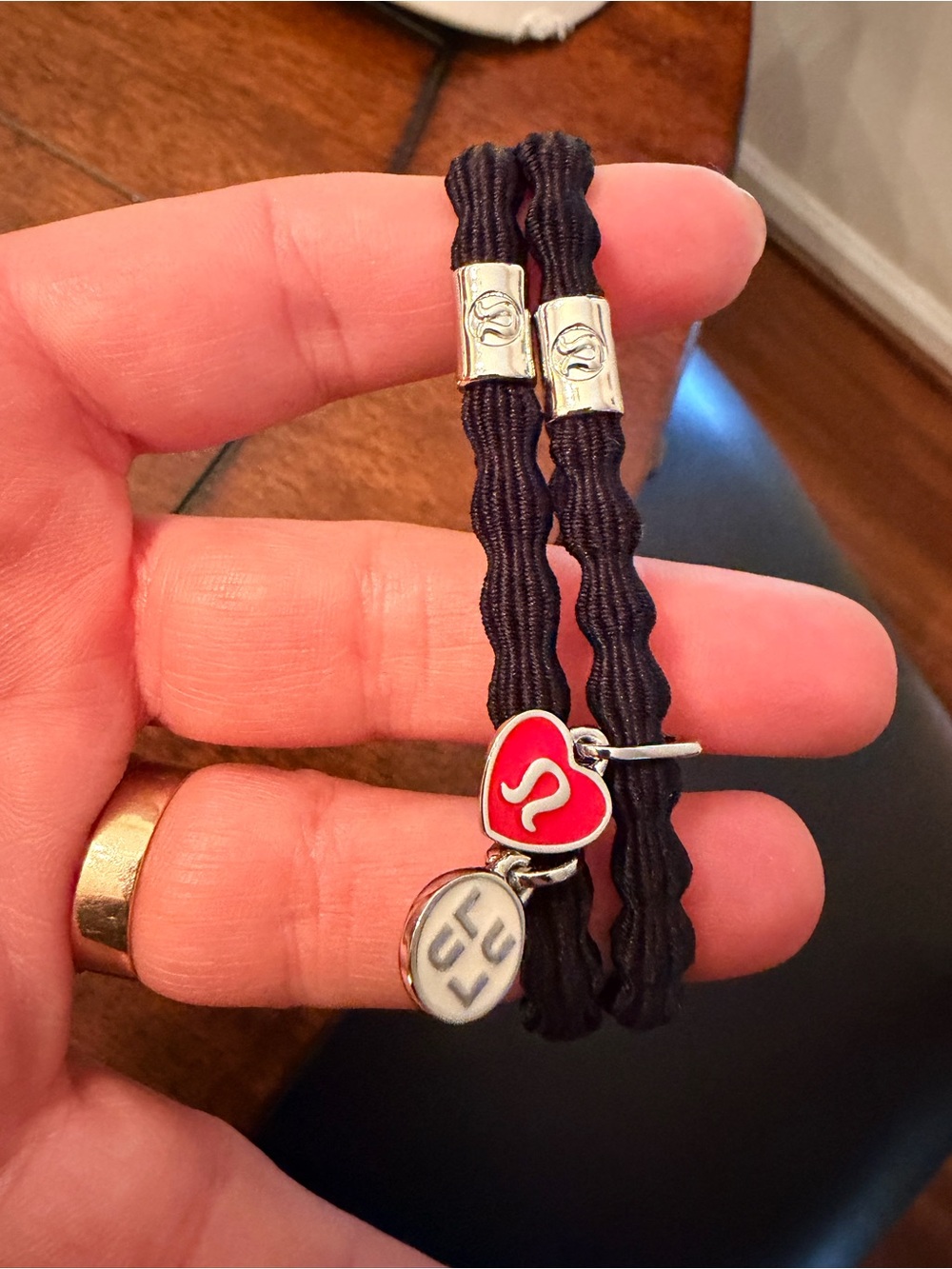 lululemon athletica Black Hair Ties with Red Heart Charm
